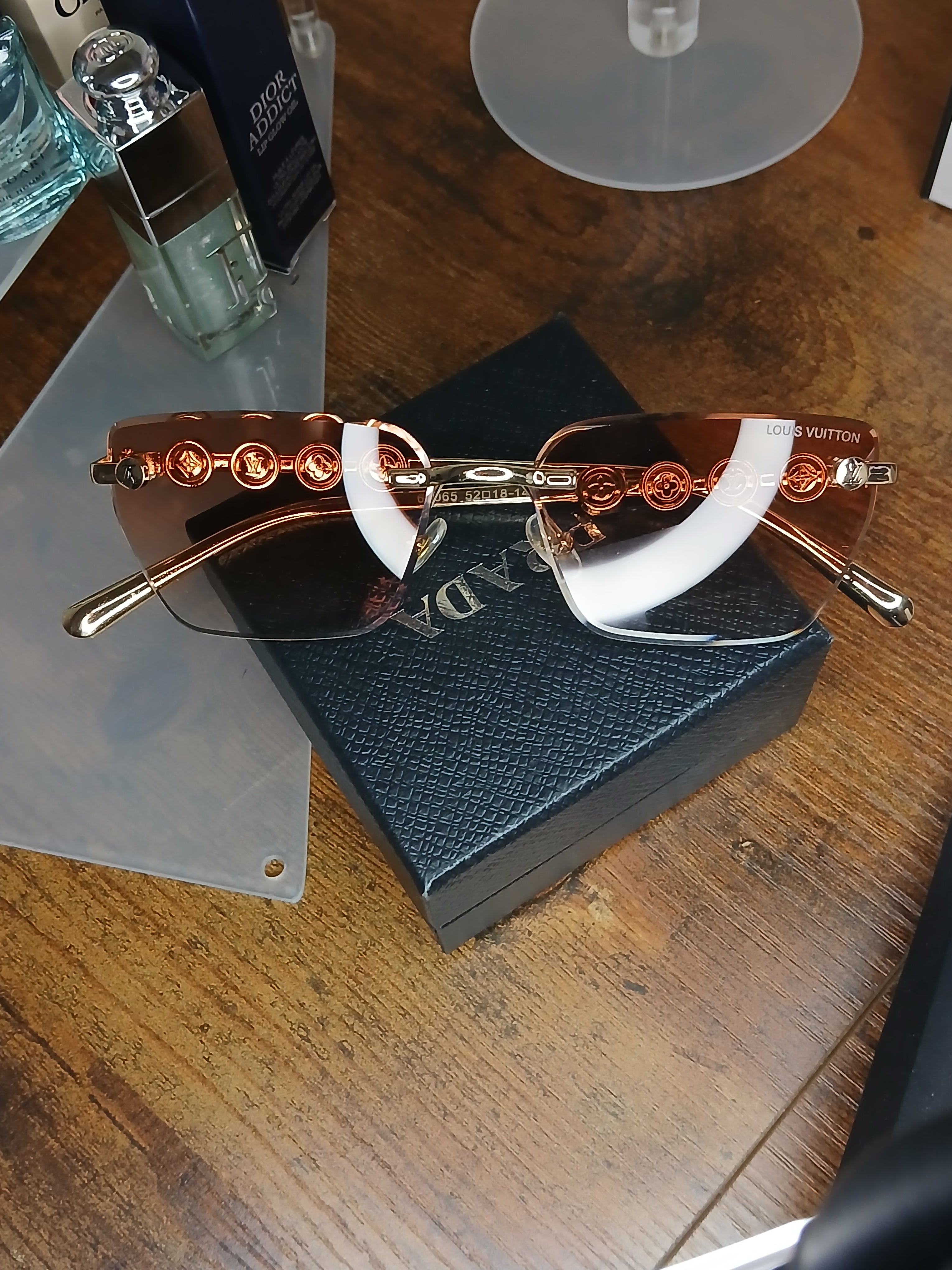 Louis Vuitton radiant peach logo rimless sunglasses with gold hardware