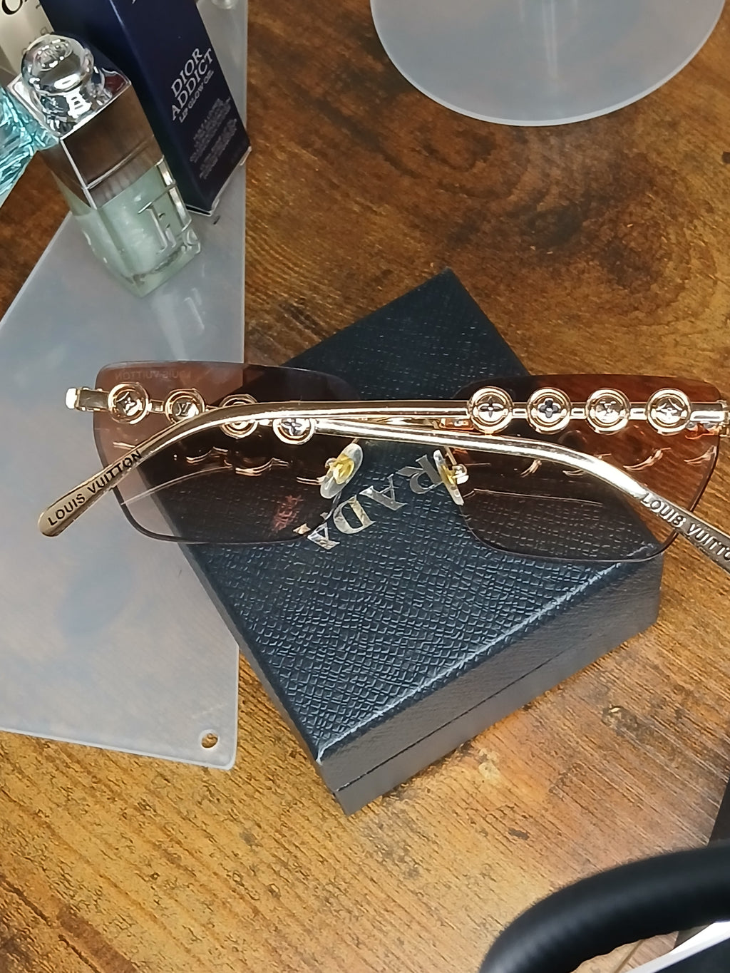 Louis Vuitton radiant peach logo rimless sunglasses with gold hardware