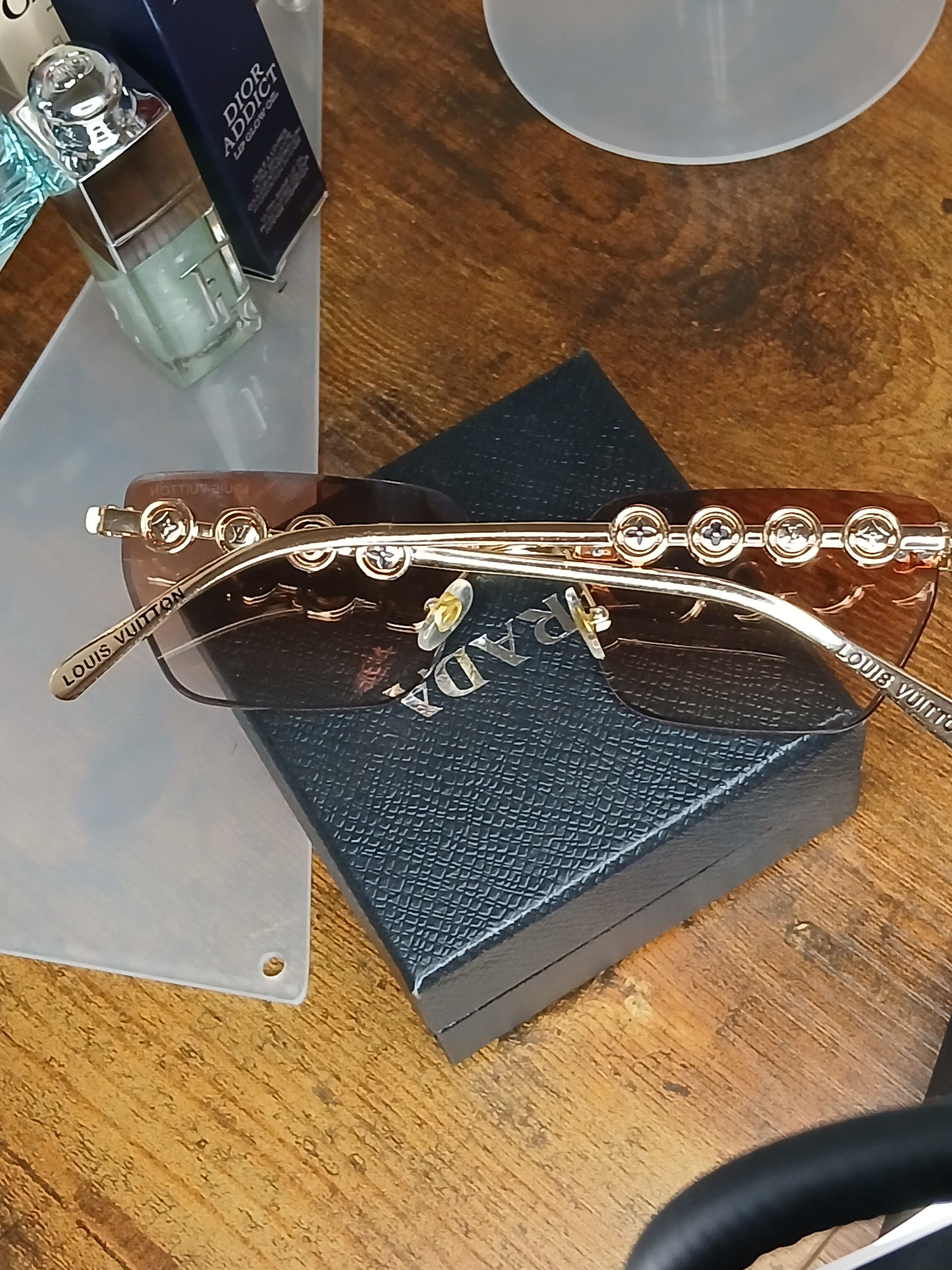 Louis Vuitton radiant peach logo rimless sunglasses with gold hardware