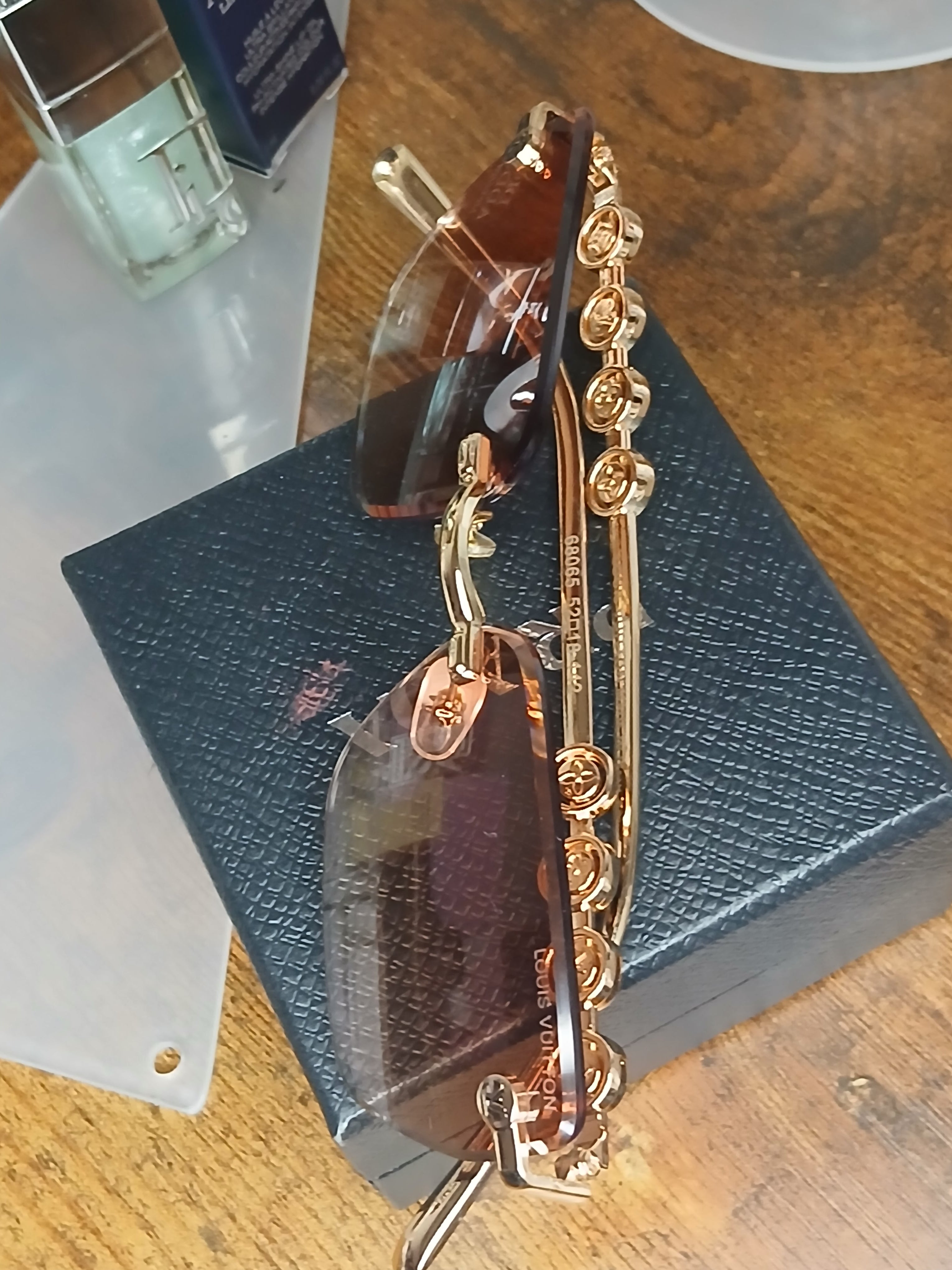 Louis Vuitton radiant peach logo rimless sunglasses with gold hardware